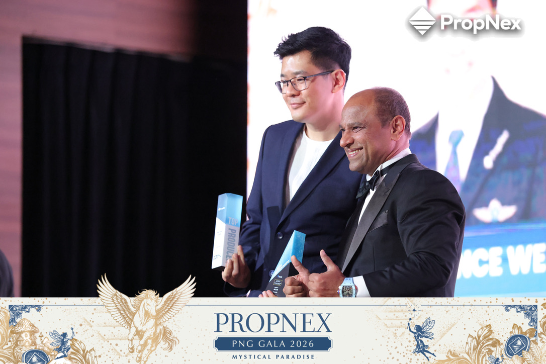 Jack Ooi receiving recognition at PropNex PNG Gala 2026